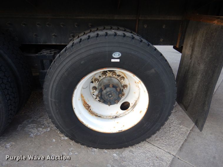 image for item JL9769 2004 Freightliner FL80  flatbed truck