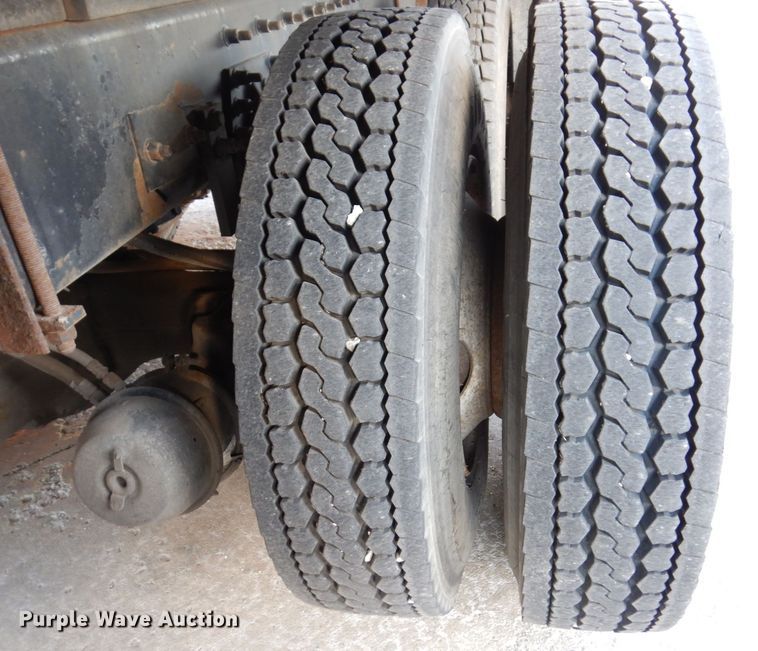 image for item JL9769 2004 Freightliner FL80  flatbed truck