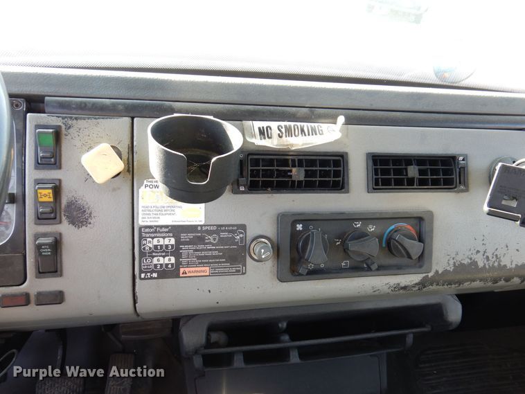 image for item JL9770 2004 Freightliner FL80  flatbed truck