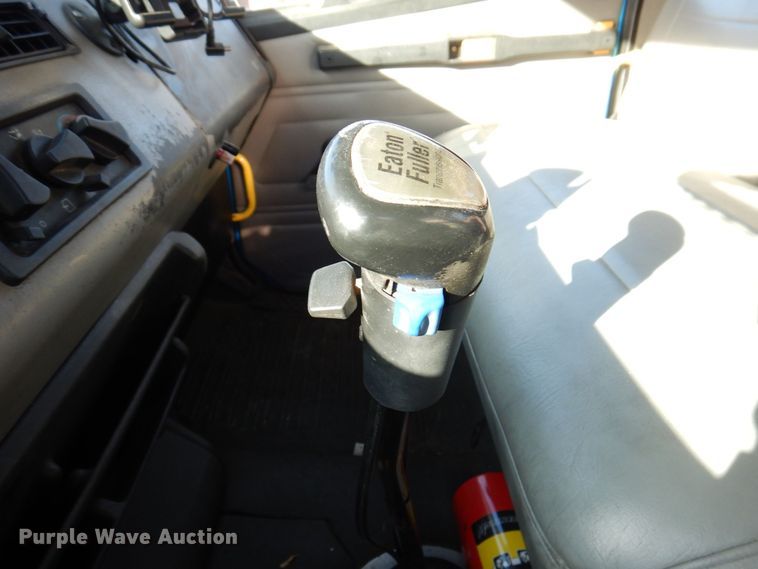 image for item JL9770 2004 Freightliner FL80  flatbed truck