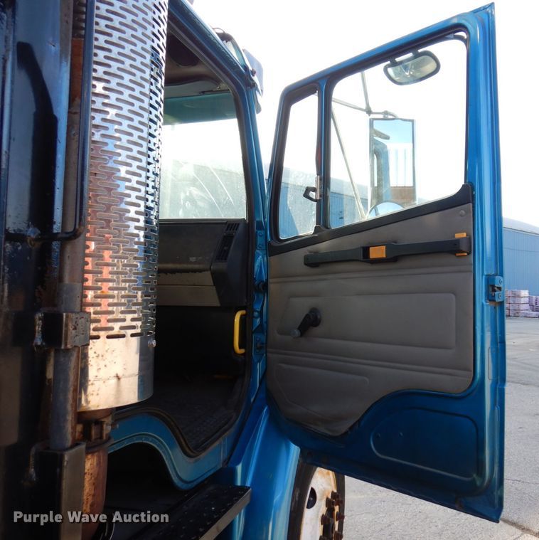 image for item JL9770 2004 Freightliner FL80  flatbed truck