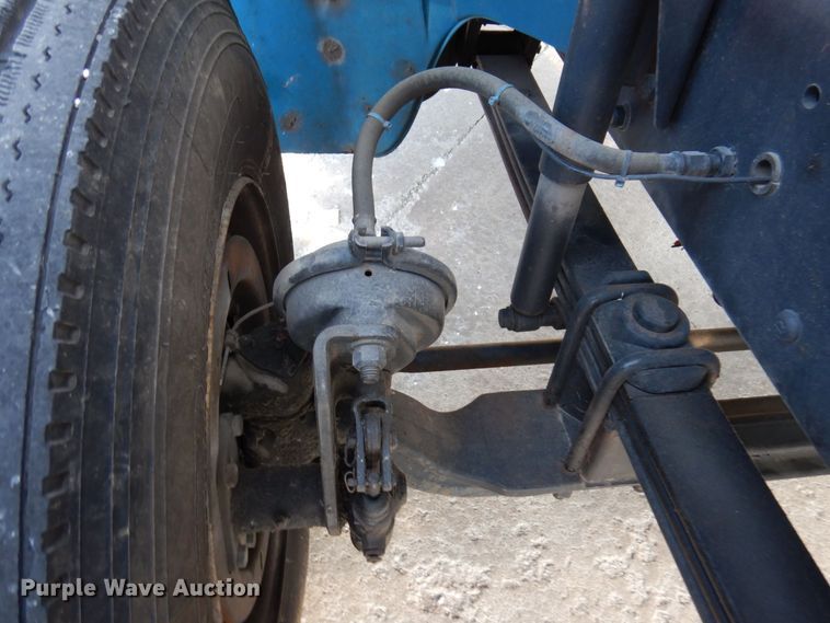 image for item JL9770 2004 Freightliner FL80  flatbed truck