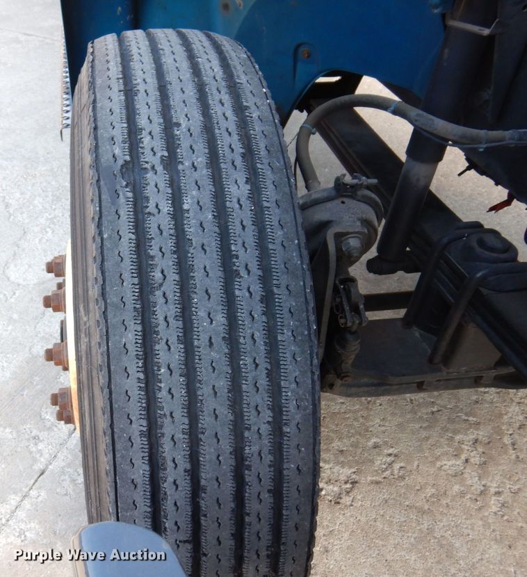 image for item JL9770 2004 Freightliner FL80  flatbed truck