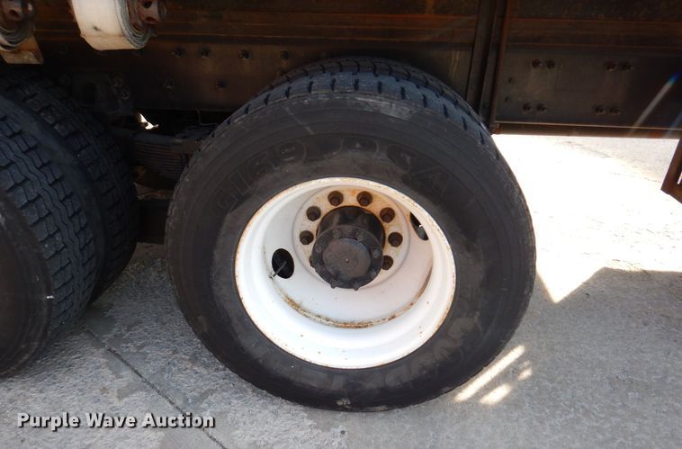 image for item JL9770 2004 Freightliner FL80  flatbed truck