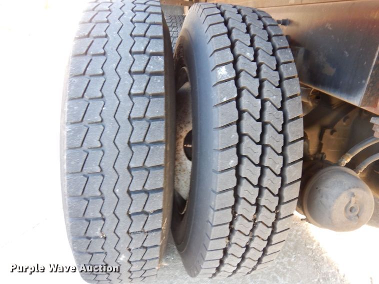 image for item JL9770 2004 Freightliner FL80  flatbed truck