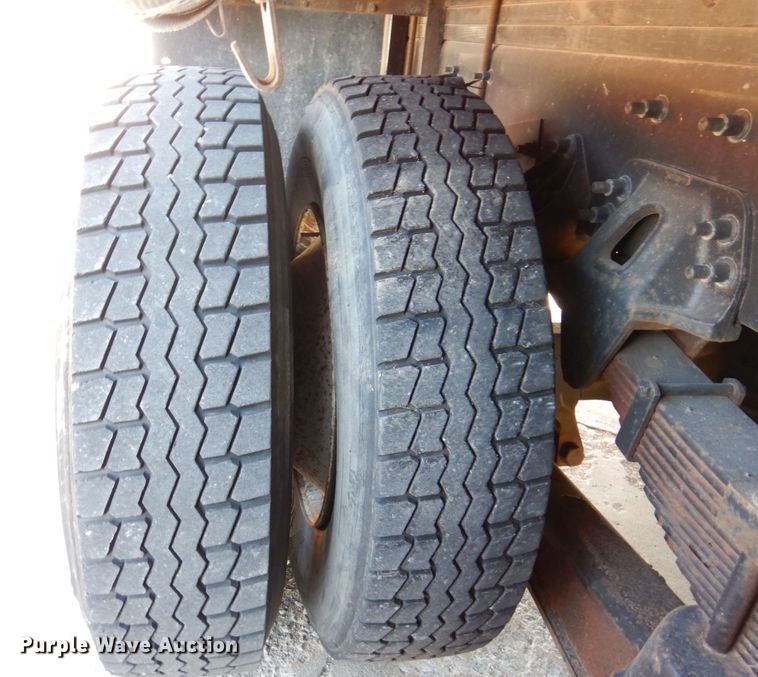 image for item JL9770 2004 Freightliner FL80  flatbed truck