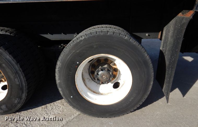 image for item JL9770 2004 Freightliner FL80  flatbed truck