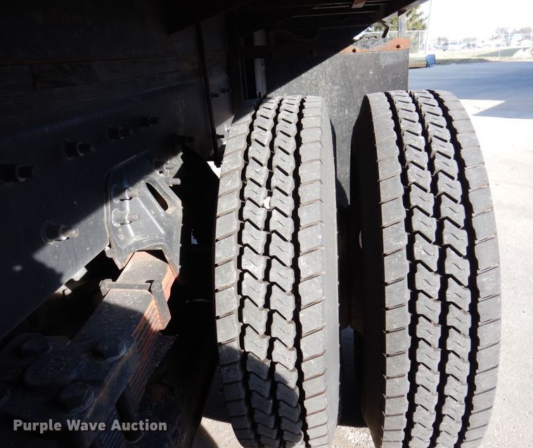 image for item JL9770 2004 Freightliner FL80  flatbed truck