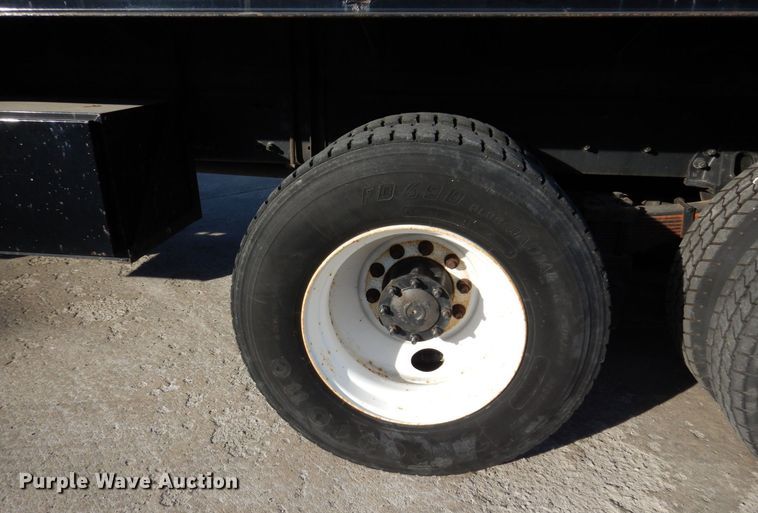 image for item JL9770 2004 Freightliner FL80  flatbed truck