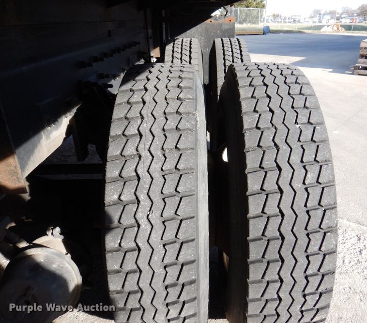 image for item JL9770 2004 Freightliner FL80  flatbed truck