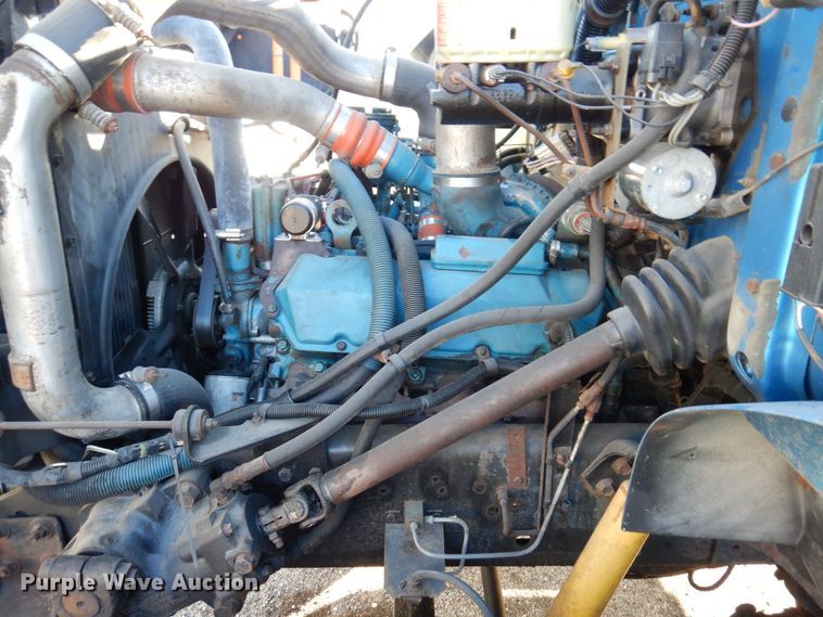 image for item JL9772 1997 International 4700  flatbed truck