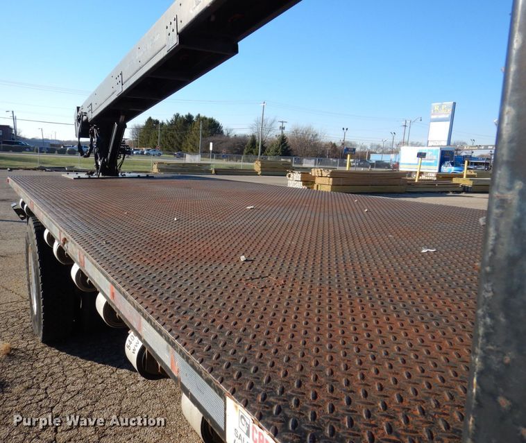 image for item JL9772 1997 International 4700  flatbed truck