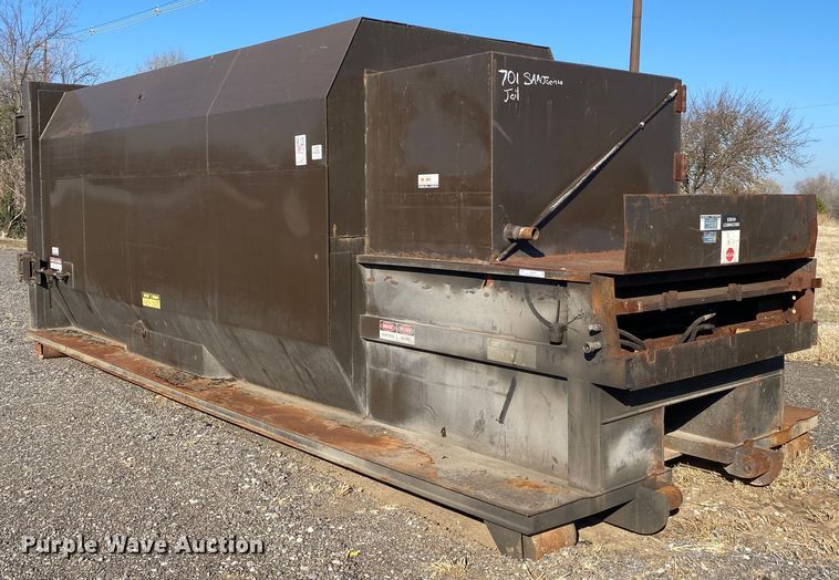Rolloff trash compactor in Collinsville, OK Item JW9287 sold Purple Wave