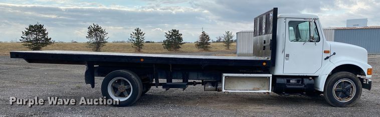 image for item JW9324 1992 International 4700  dump flatbed truck