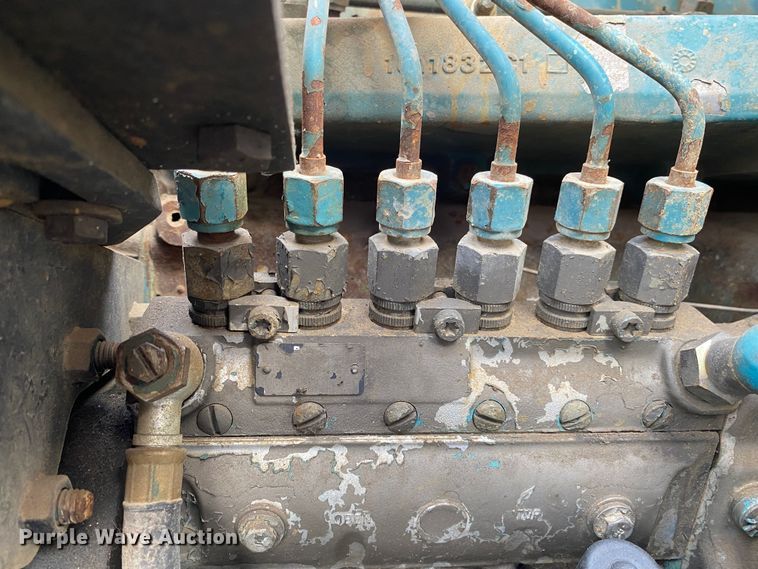 image for item JW9324 1992 International 4700  dump flatbed truck