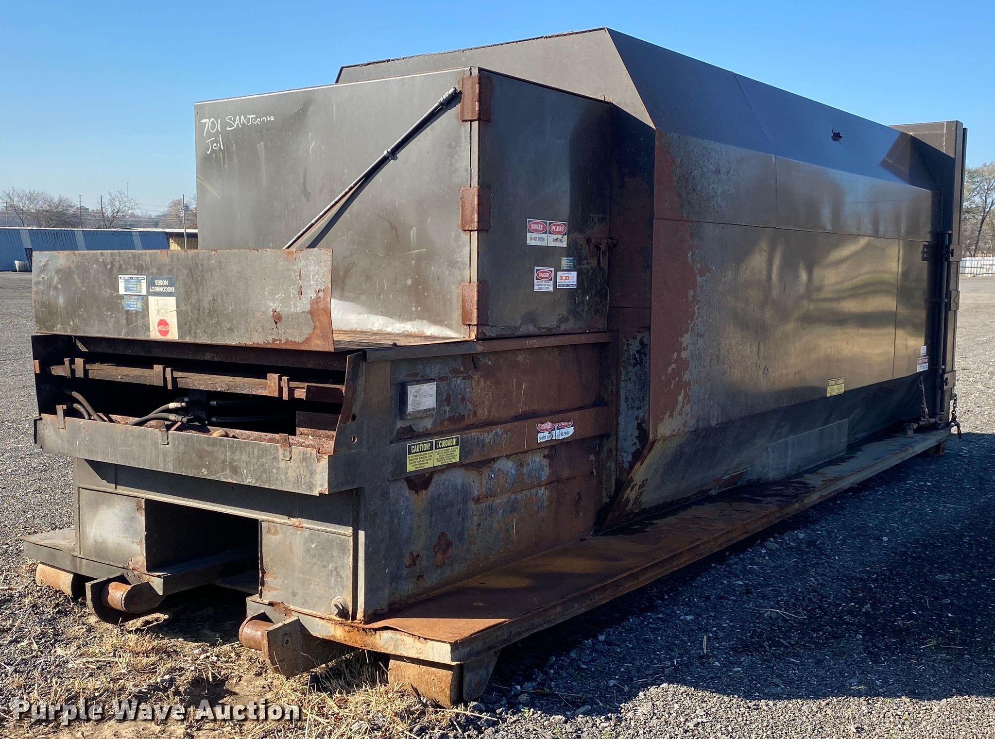Rolloff trash compactor in Collinsville, OK Item JW9287 sold Purple Wave