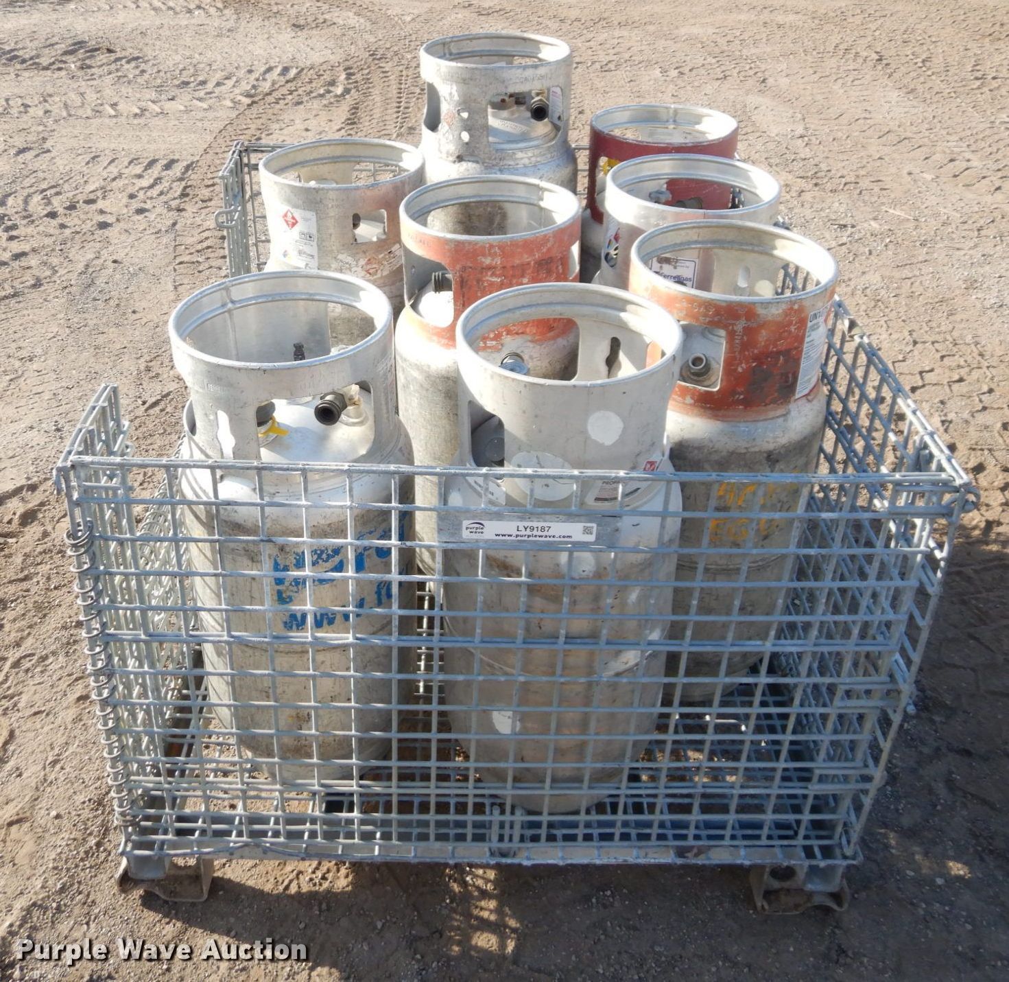 Approximately 8 aluminum propane tanks in Lawrence, KS Item LY9187