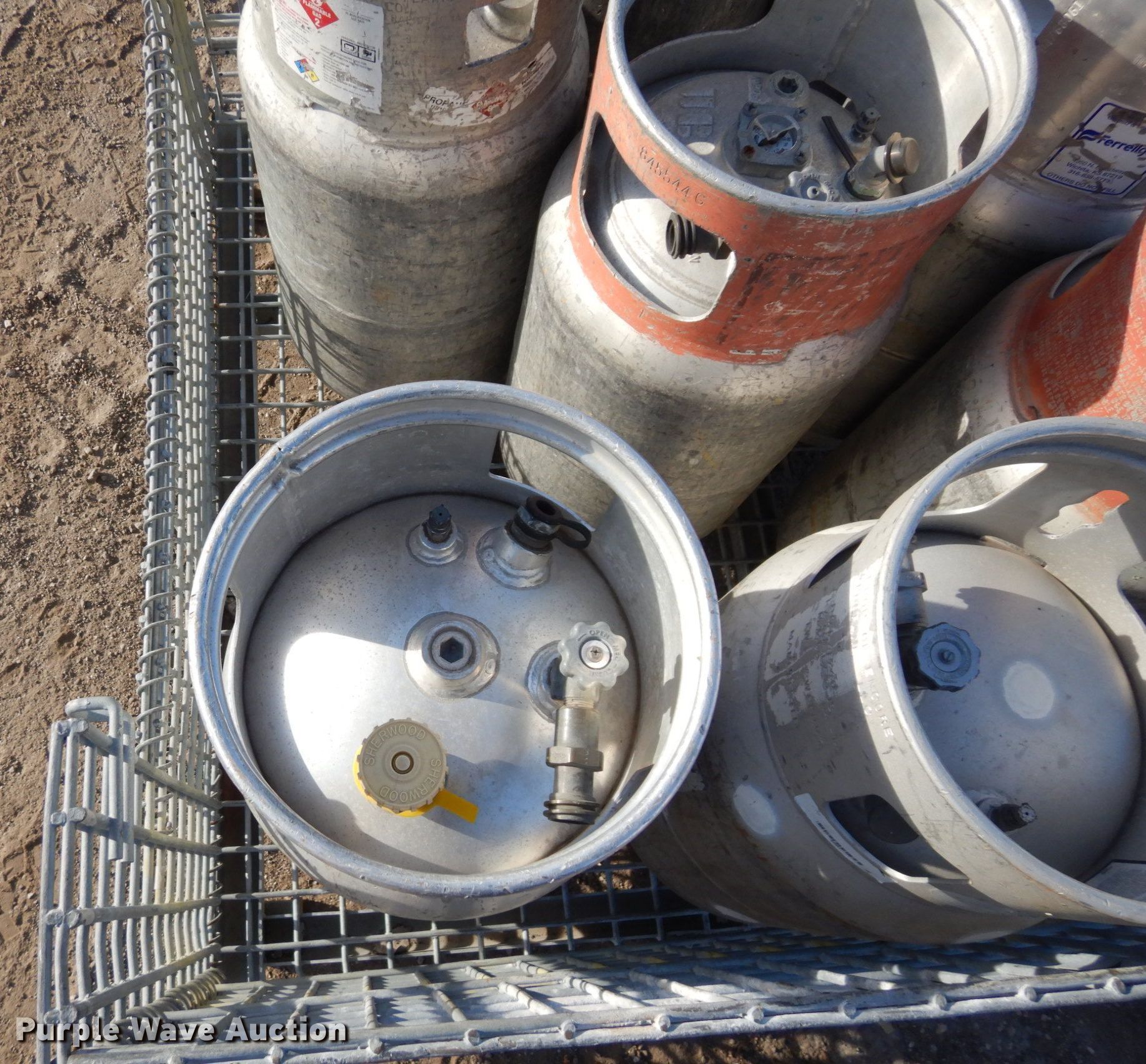 Approximately 8 aluminum propane tanks in Lawrence, KS Item LY9187