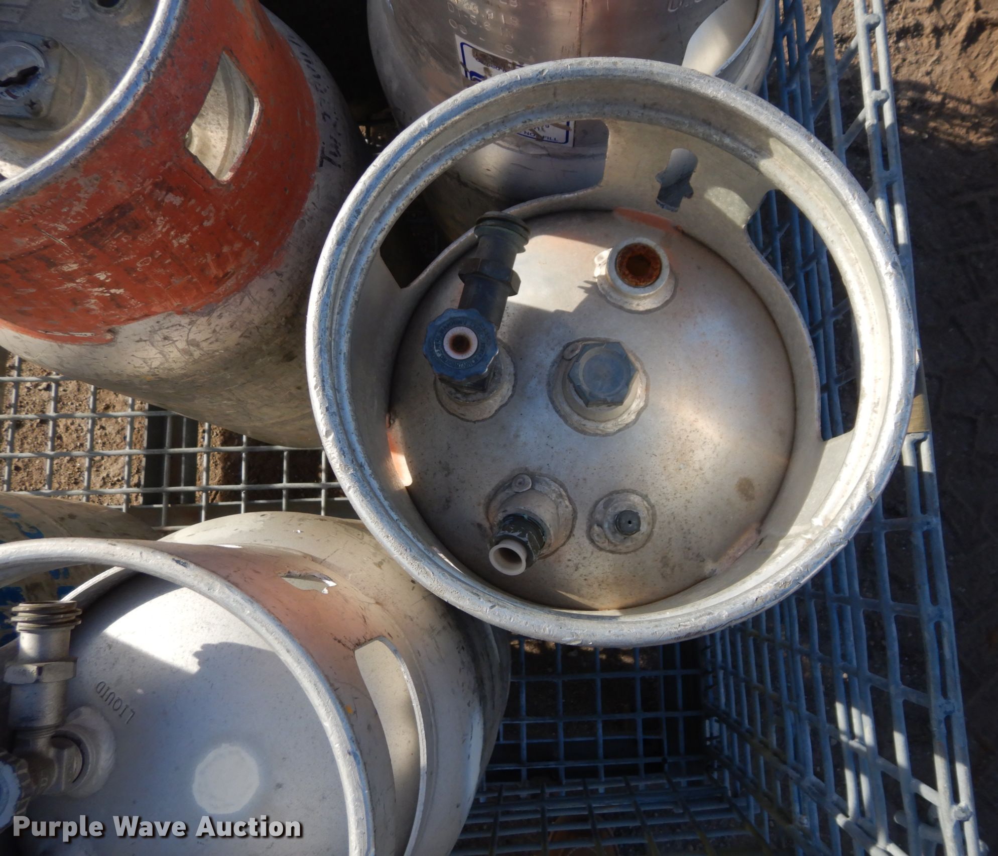 Approximately 8 aluminum propane tanks in Lawrence, KS Item LY9187