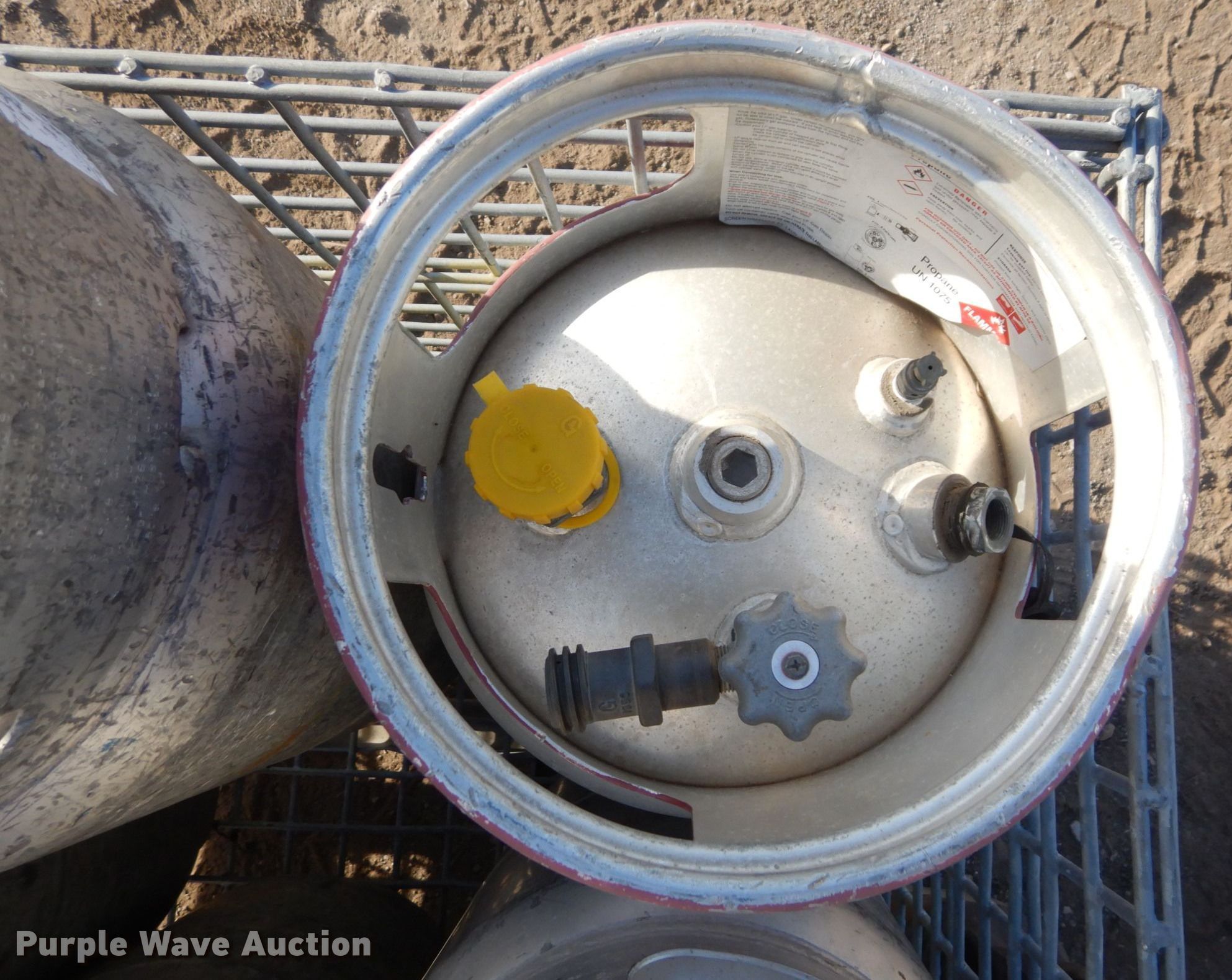 Approximately 8 aluminum propane tanks in Lawrence, KS Item LY9187