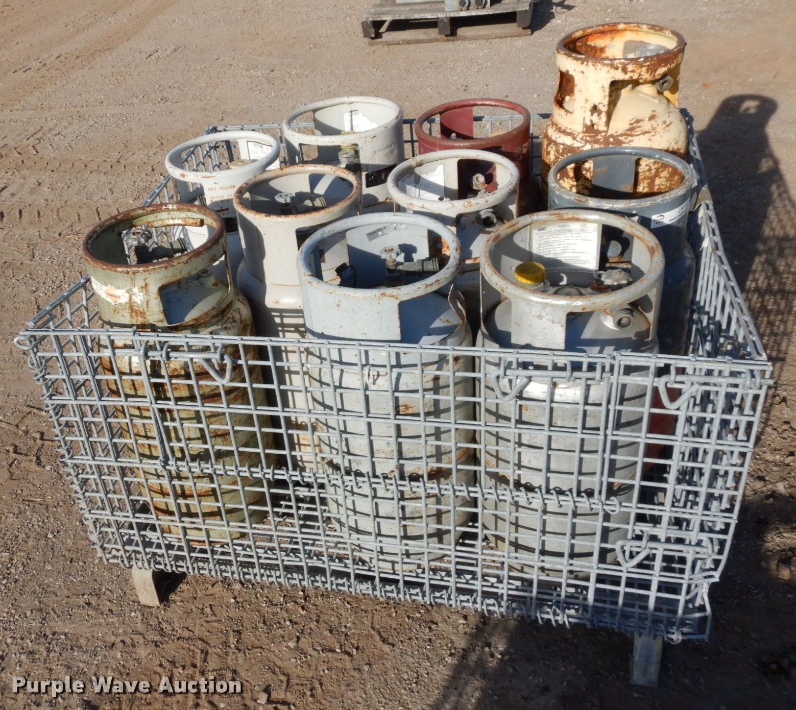 Approximately 9 steel propane tanks in Lawrence, KS Item LY9188 sold