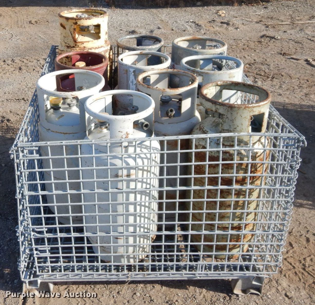 Approximately 9 steel propane tanks in Lawrence, KS Item LY9188 sold