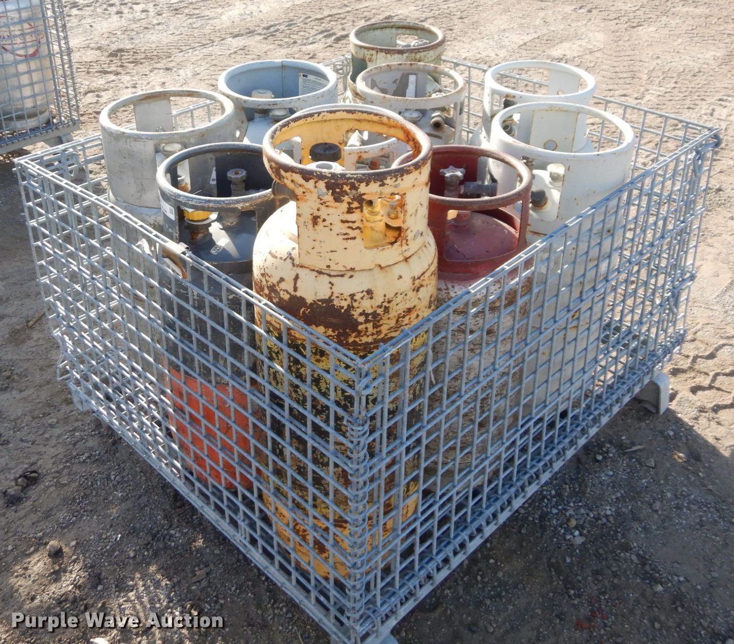 Approximately 9 steel propane tanks in Lawrence, KS Item LY9188 sold