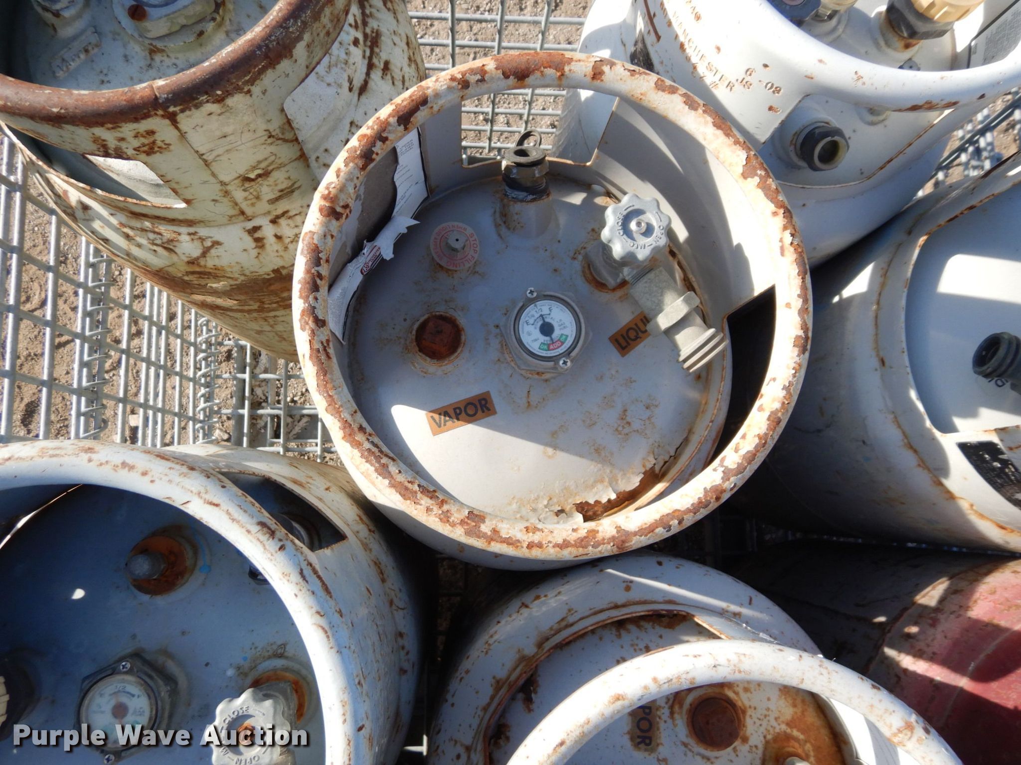 Approximately 9 steel propane tanks in Lawrence, KS Item LY9188 sold