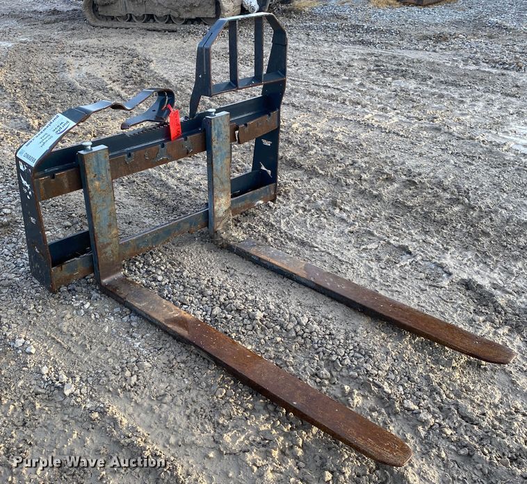 48"L skid steer forks in Tulsa, OK Item DN8098 sold Purple Wave