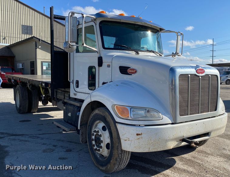 image for item DN8122 2015 Peterbilt 330  dump flatbed truck