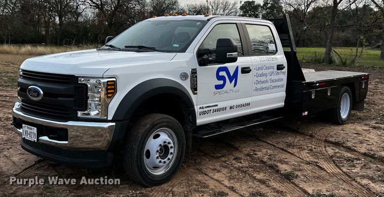 image for item DQ1928 2019 Ford F550 Super Duty  Crew Cab flatbed truck