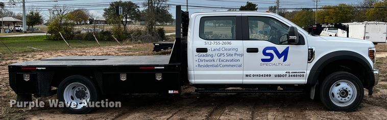 image for item DQ1928 2019 Ford F550 Super Duty  Crew Cab flatbed truck