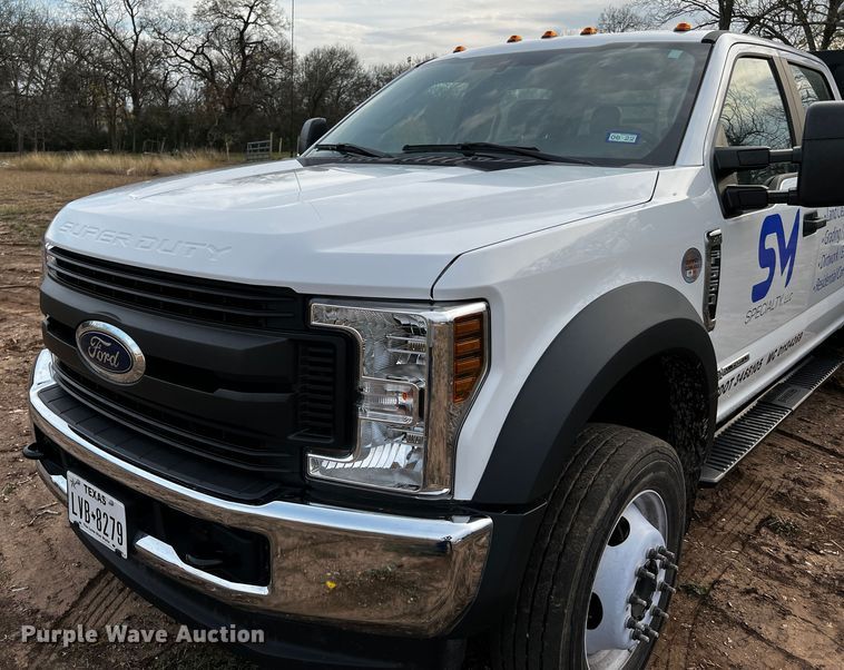 image for item DQ1928 2019 Ford F550 Super Duty  Crew Cab flatbed truck