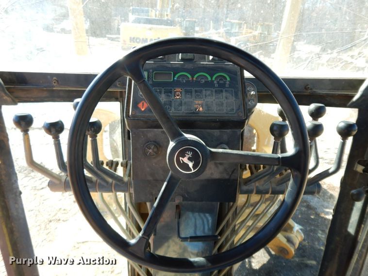 image for item HG9305 2004 John Deere 770CH  motor grader