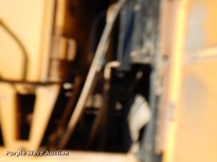 image for item HG9305 2004 John Deere 770CH  motor grader