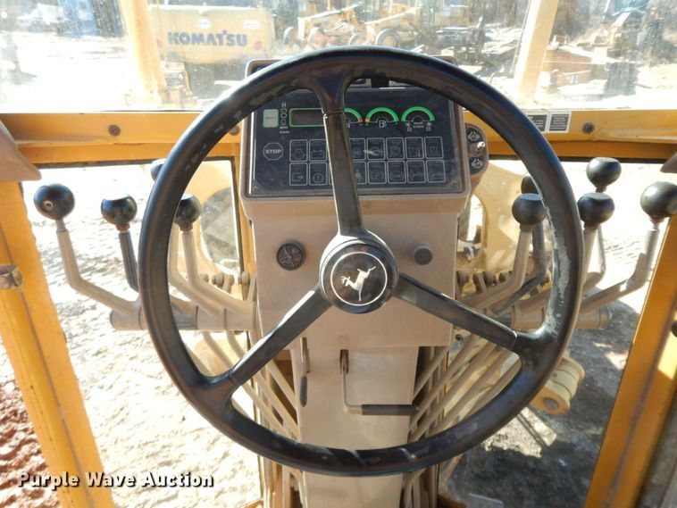 image for item HG9306 1999 John Deere 770CH  motor grader