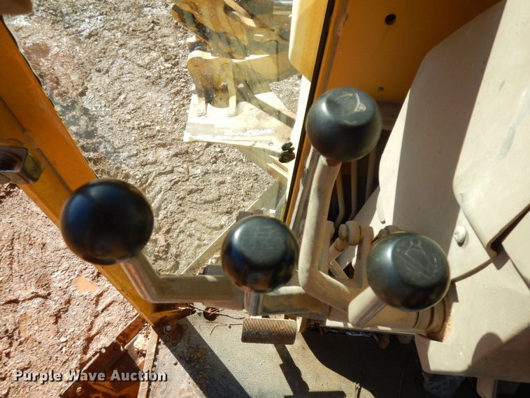 image for item HG9306 1999 John Deere 770CH  motor grader