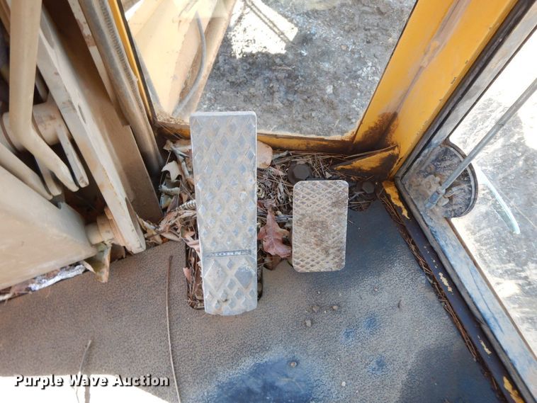 image for item HG9306 1999 John Deere 770CH  motor grader