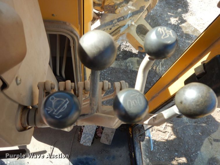 image for item HG9306 1999 John Deere 770CH  motor grader