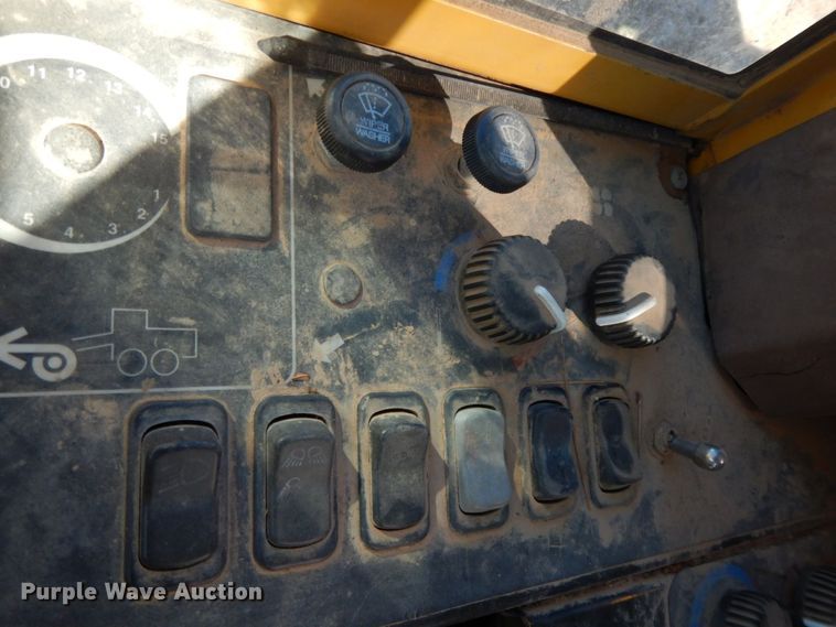 image for item HG9306 1999 John Deere 770CH  motor grader