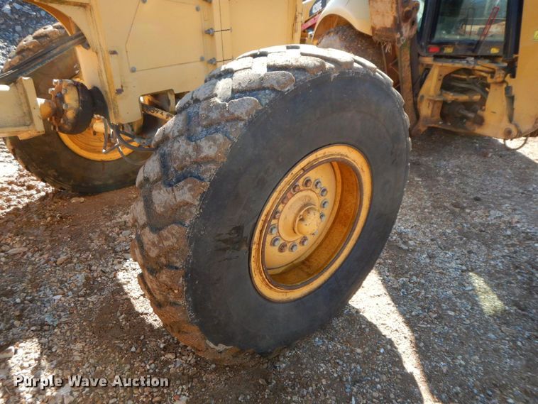 image for item HG9306 1999 John Deere 770CH  motor grader