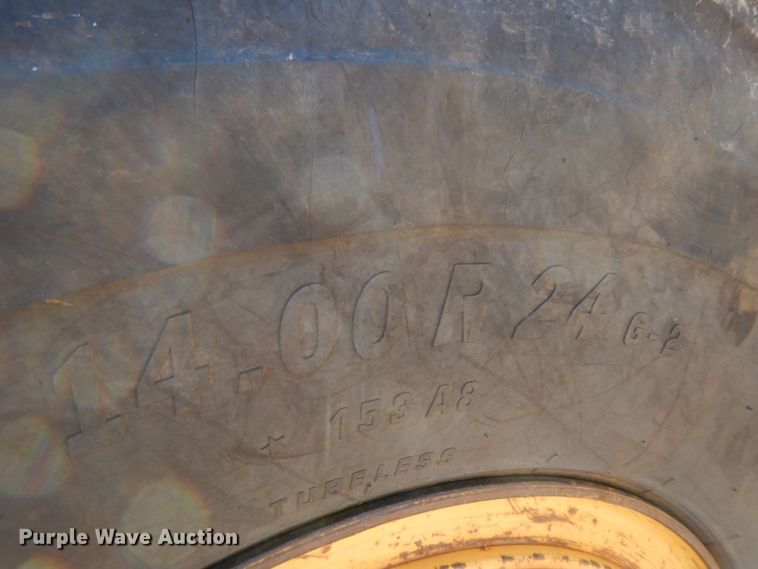 image for item HG9306 1999 John Deere 770CH  motor grader