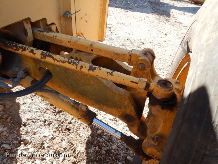 image for item HG9306 1999 John Deere 770CH  motor grader