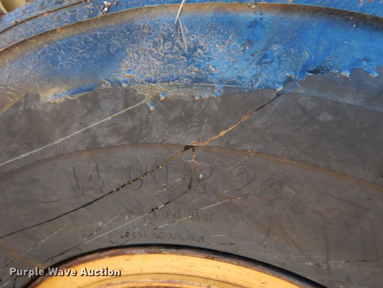 image for item HG9306 1999 John Deere 770CH  motor grader