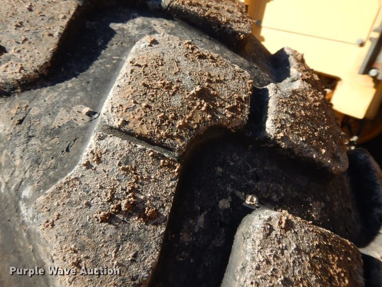 image for item HG9306 1999 John Deere 770CH  motor grader