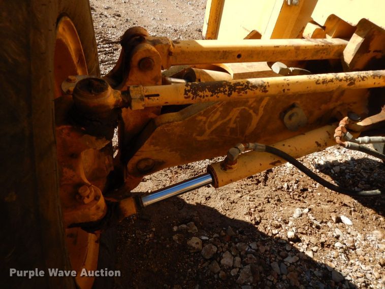 image for item HG9306 1999 John Deere 770CH  motor grader