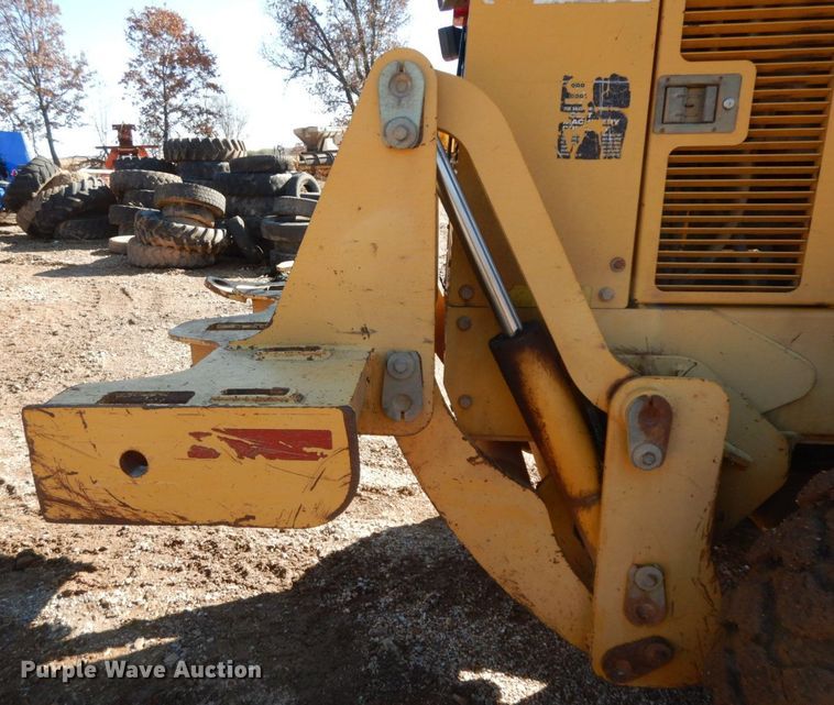 image for item HG9306 1999 John Deere 770CH  motor grader