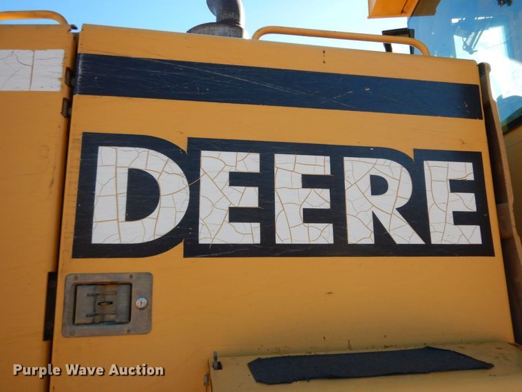 image for item HG9306 1999 John Deere 770CH  motor grader