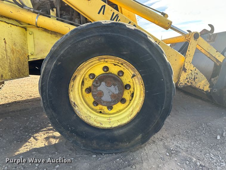 image for item JD9680 New Holland 555E  backhoe