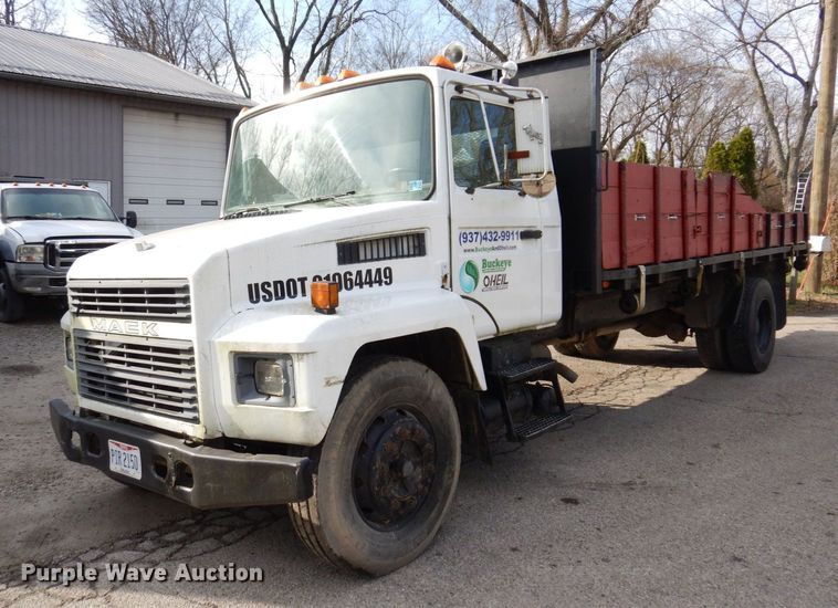 image for item JL9759 1997 Mack CS300P  dump flatbed truck